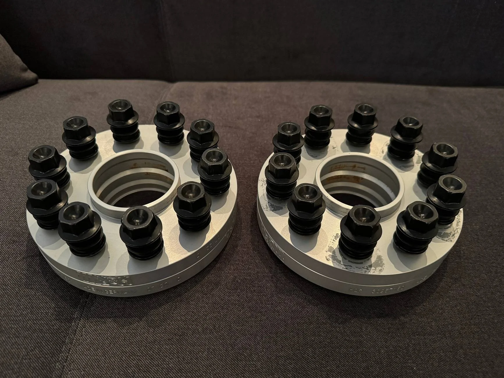 Porsche Taycan FS: 15mm H&R TRAK+ wheel spacers w/ Rennline extended bolts (Los Angeles) 02_spacers_bolts